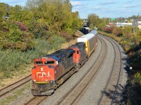 CN 8881 & CN 5404 lead CN 401 westwards through Montreal West. For more train photos, check out http://www.flickr.com/photos/mtlwestrailfan/ 