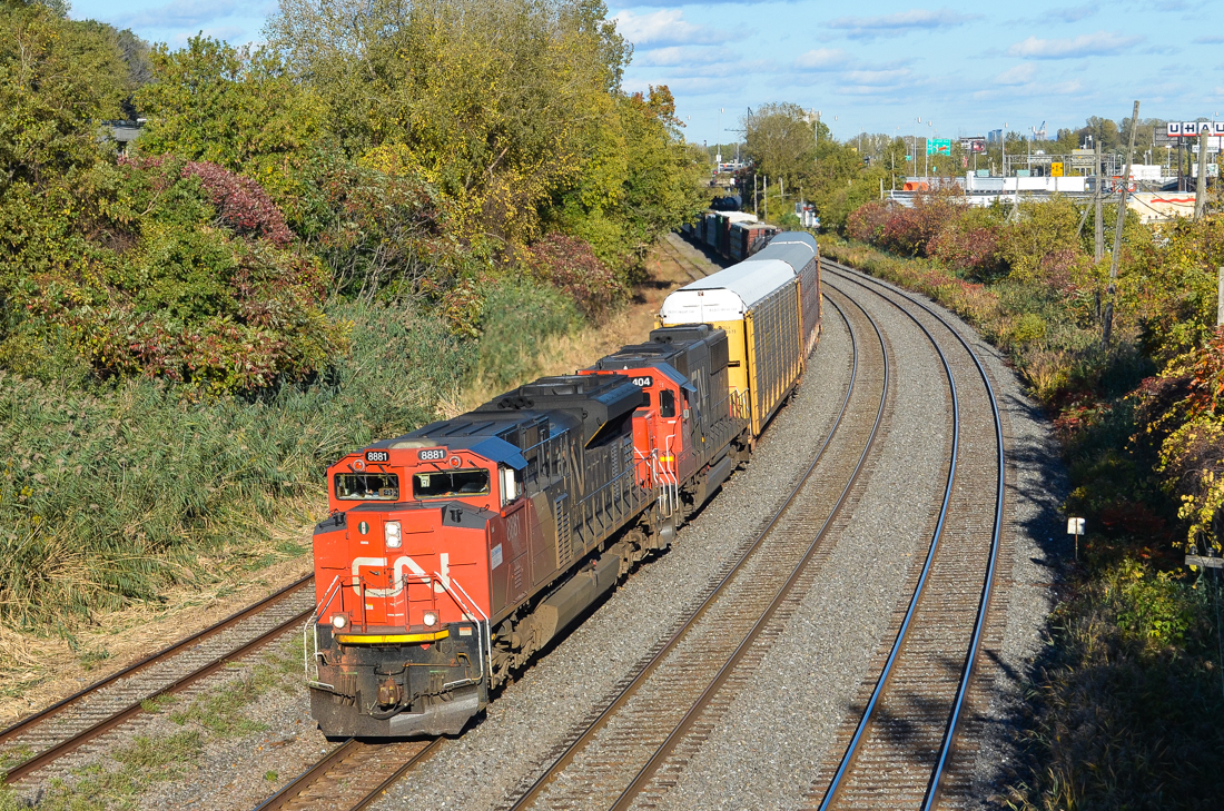 CN 8881 & CN 5404 lead CN 401 westwards through Montreal West. For more train photos, check out http://www.flickr.com/photos/mtlwestrailfan/
