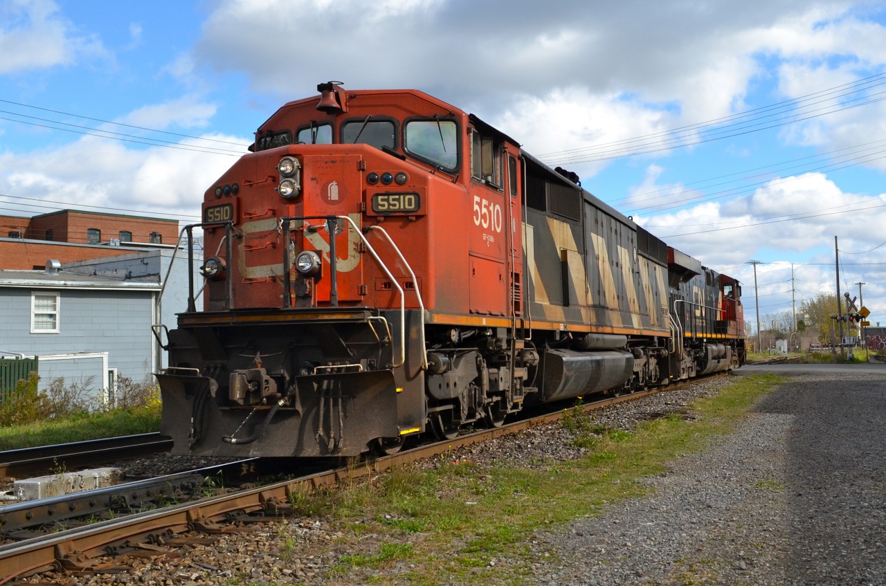 CN 5510 & CN 2274 head west light through St-Henri just a couple of minutes after CN 527 passed in the same direction. For more train photos, check out http://www.flickr.com/photos/mtlwestrailfan/
