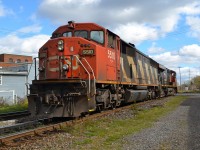 CN 5510 & CN 2274 head west light through St-Henri just a couple of minutes after CN 527 passed in the same direction. For more train photos, check out http://www.flickr.com/photos/mtlwestrailfan/