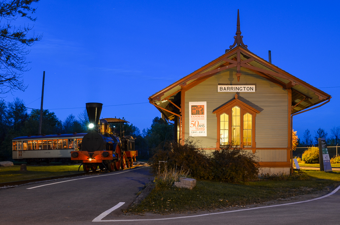 Hays Station at dusk. Just after sunset we see the 'John Molson' steam engine and a streetcar (STM 1959) at Hays Station. This was part of the 'Illuminated Trains' night shoot at Exporail. For more train photos, check out http://www.flickr.com/photos/mtlwestrailfan/