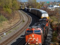<b>CN's last ES44DC.</b> CN 2344, 3 years old now, is CN's last ES44DC. Here it leads CN 401 westwards through Montreal West. Trailing are CN 2570 & CN 4018. For more train photos, check out http://www.flickr.com/photos/mtlwestrailfan/ 