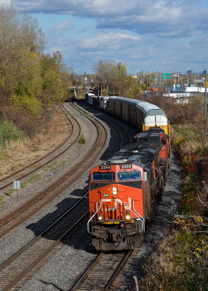 CN's last ES44DC. CN 2344, 3 years old now, is CN's last ES44DC. Here it leads CN 401 westwards through Montreal West. Trailing are CN 2570 & CN 4018. For more train photos, check out http://www.flickr.com/photos/mtlwestrailfan/