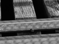 <b>134 year old rail.</b> This rail is on the gauntlet track on a bridge over the Missisquoi river on MMA's Stanbridge Sub in Bedford, Qc. The main rail is from the 1920s/30s. This bridge was constructed in 1879 by the South Eastern Railway, a CP predecessor, so this gauntlet rail has never been changed. The whole subdivision including the bridge was in use until a couple of months ago; it is out of service now at Transport Canada's orders until the condition of the whole line is improved. For more train photos, check out http://www.flickr.com/photos/mtlwestrailfan/ 