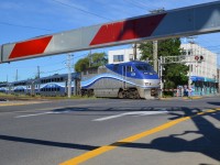 AMT 1330 is in charge of AMT 186 on its way from Saint-Jérôme to downtown Montreal as it crosses Westminster avenue in Montreal West during the morning rush hour. For more train photos, check out http://www.flickr.com/photos/mtlwestrailfan/