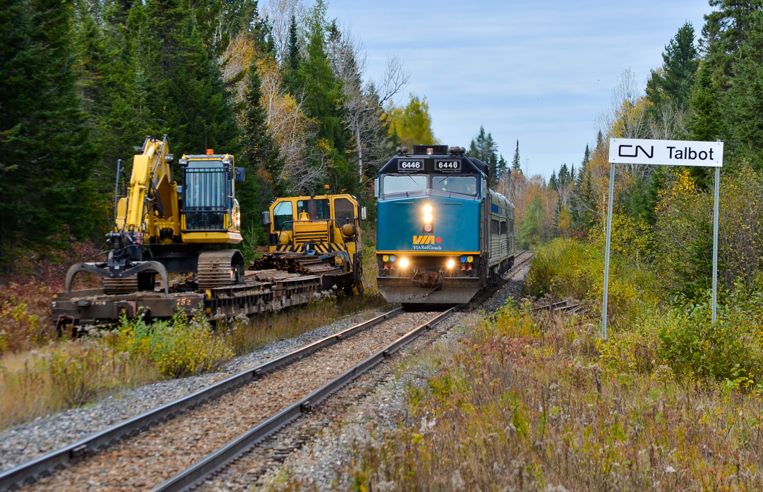 VIA's train from Jonquière in northern Quebec is about 90 minutes late as it passes some MoW equipment on the Talbot siding. The train consists of VIA 6446 followed by two stainless steel coaches and a baggage car. The power is turned at Jonquière on a turntable, but the cars are not turned, hence the baggage car at the rear end. For more train photos, check out http://www.flickr.com/photos/mtlwestrailfan/