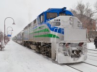 While on lease to the AMT last winter, RBRX 18533 (an ex-GO Transit F59PH) pushes a train into Montreal West Station as the snow falls. This engine is painted for MI Transit, a commuter train operation in Michigan which has not started operation as of yet. This engine is currently on lease to Metrolink, where it will not see weather like this! For more train photos, check out http://www.flickr.com/photos/mtlwestrailfan/  