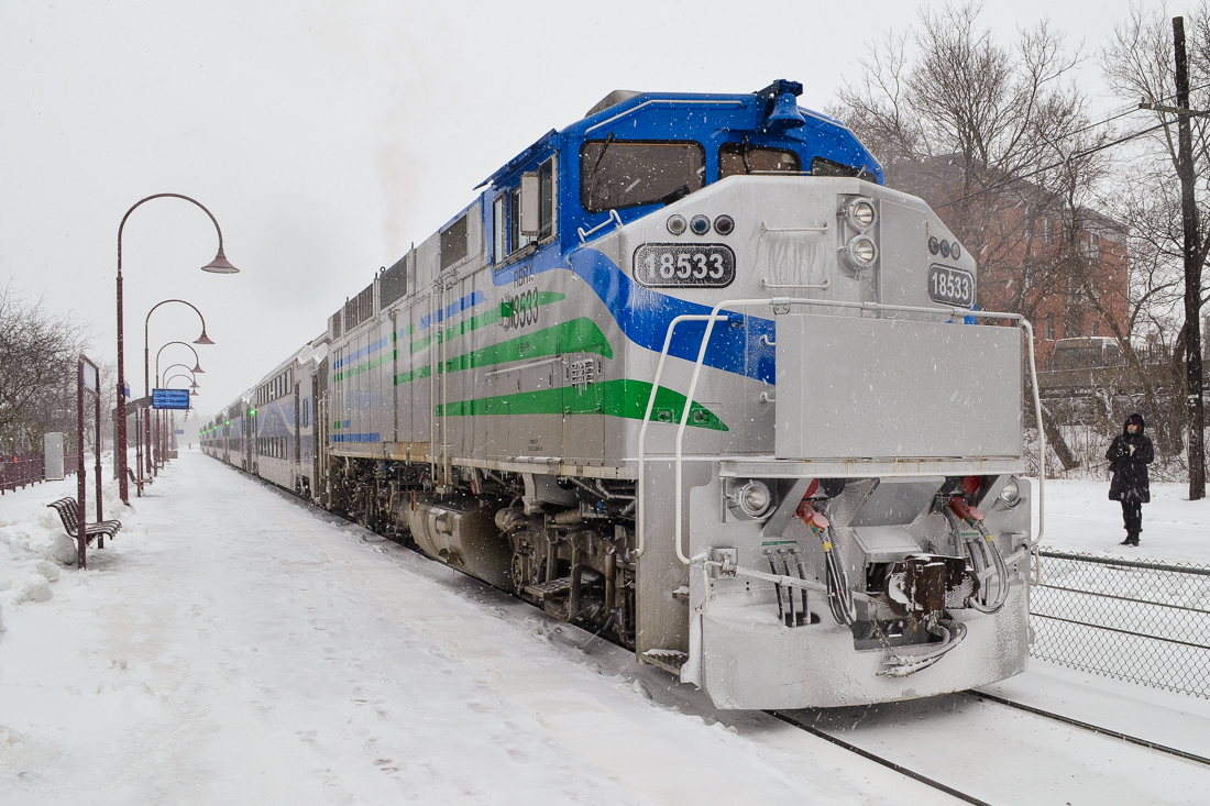 While on lease to the AMT last winter, RBRX 18533 (an ex-GO Transit F59PH) pushes a train into Montreal West Station as the snow falls. This engine is painted for MI Transit, a commuter train operation in Michigan which has not started operation as of yet. This engine is currently on lease to Metrolink, where it will not see weather like this! For more train photos, check out http://www.flickr.com/photos/mtlwestrailfan/