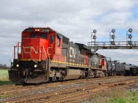 A well timed sucker hole of sunshine illuminates CN 331 as it pulls off the north service track at Paris West with a healthy cut of cars dropped off by SOR in the night. Thanks to Mr. Bishop for the heads up. 