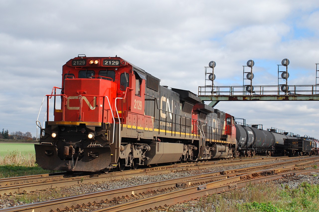 A well timed sucker hole of sunshine illuminates CN 331 as it pulls off the north service track at Paris West with a healthy cut of cars dropped off by SOR in the night. Thanks to Mr. Bishop for the heads up.
