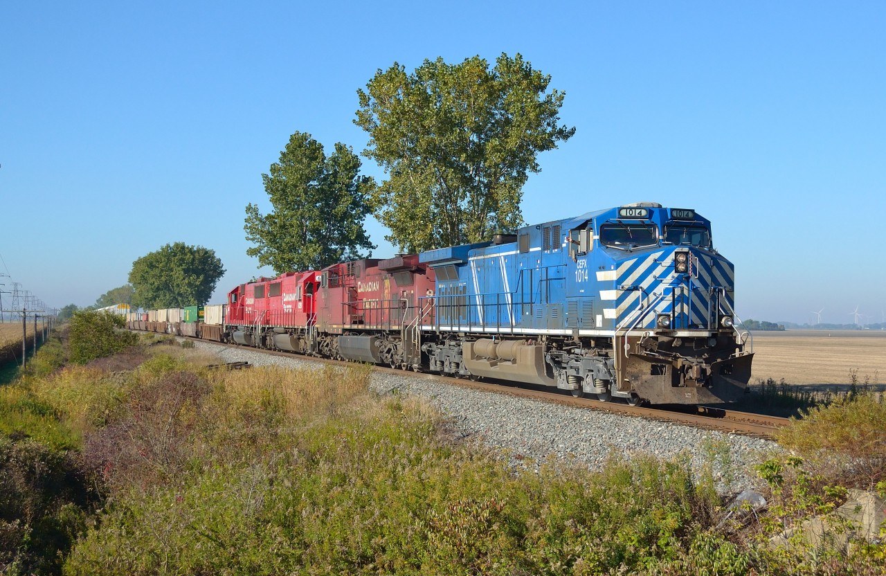 CP 240 passes eastbound thru Jeannette led by CEFX 1014, CP 9605, CP 6251 & CP 6246. Engineer Dave with the friendly wave as usual.