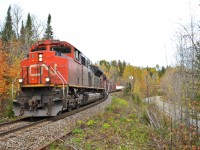CN 369 heading south, led by CN 8834, CN 8851 & IC 2719. Operating mid-train was CN 5650 & CN 8893. This train weighed slightly over 13,000 tons. This is the scenic and up and down CN Lac St-Jean sub.