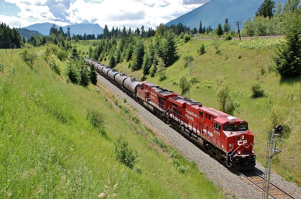 CP 9373 is bringing a load of tank cars up the grade on the north track @Carlin and is headed westwards towards the Notch Hill loop.