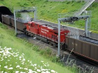 CP 8931 is the mid-train dp unit on this westbound coal train as it passes through the coal sprayers @Carlin.