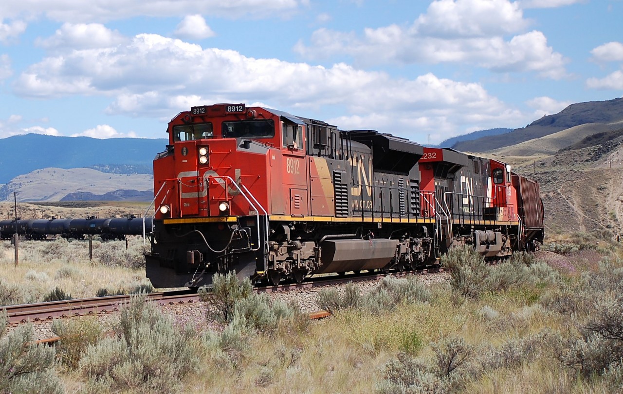 CN nos.8912&2232 bring a westbound mixed freight past Juniper Beach in the Thompson Valley.