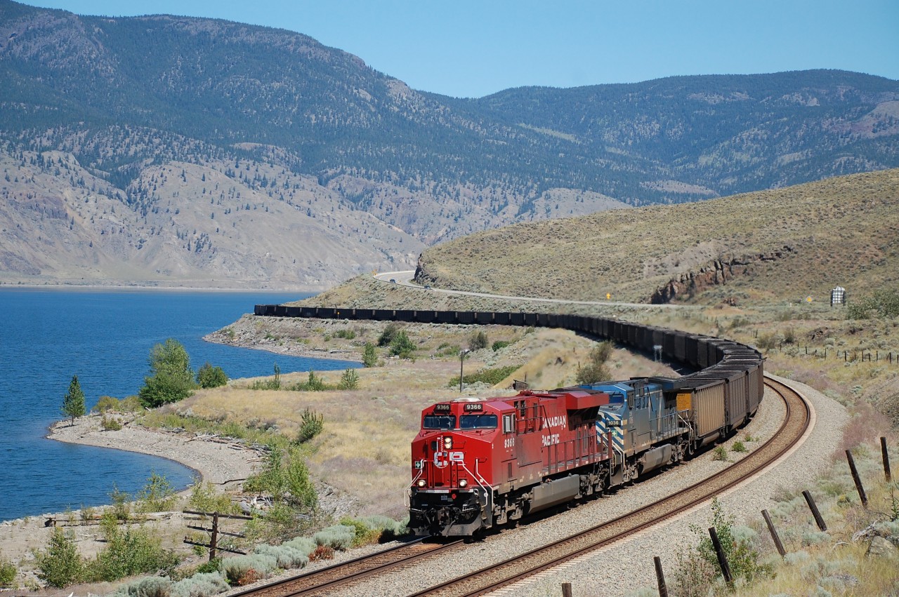 CP nos.9366& CEFX 1036 approach Tunkwa(mile 24.1 on the Thompson sub.) in charge of a westbound coal train.