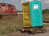 I would suppose that this may be one of the more important pieces of equipment that travels with the tie gang; the honeypot car. 1640hrs.