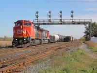 CN 331 with a pair of ex BNSF Dash 8's throttle up out of the North Service Track at Paris West with their lift. <br> Thanks to Rob Smith for showing me how to get here today