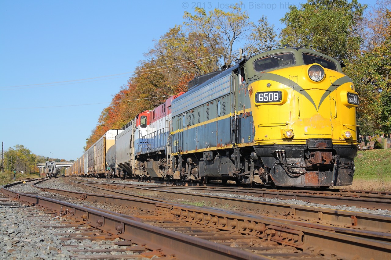 The Woodstock Job sits at Woodstock awaiting notification that they have the signal at CN Carew.  OSXR 6508 and OSRX 644 are in charge of today's train.  It was a great day of chasing the OSR and getting to see this classic F unit.