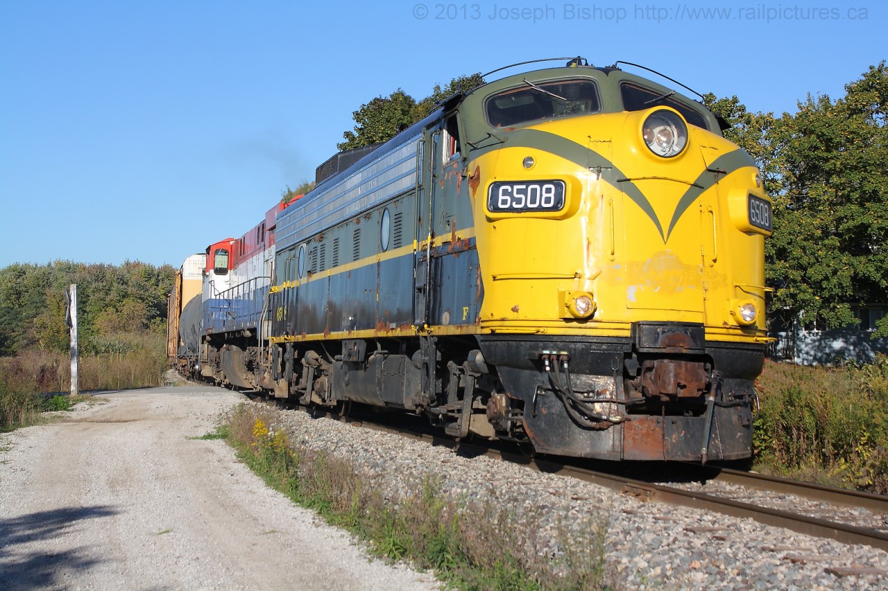 OSRX 6508 and OSRX 644 make their way towards the GM Cami plant to drop off their train and then procede back to Salford for the weekend.  This was the end of a great day and chase!