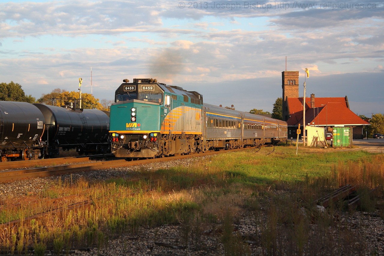 Via 83 accelerates out of Brantford after its station stop.  Via 6459 is on the point.  Via 6459 was renumbered from Via 6403 this year because of an image of 6403 appearing on our new ten dollar bills.
