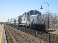 AMT 1310 (GP9) and AMT 605 (generator car) are at what is the rear end of this westbound commuter train, as the train is in push mode. The GP9 and generator car would be permanently out of AMT service by the end of 2009. The 700 series cars which are behind the generator car would be out of service for nearly three years, but have just started to reenter service during the past couple of weeks, freshly repainted and refurbished.