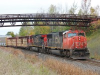 With the nice horn show for the threesome of railfans, CN 382 slowly crawls thru Scotch Block at mile 30.29 of the Halton subdivision.