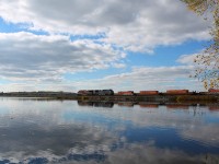 Wildly blowing the horn for trespassers fishing off of the dam, a pretty decent lashup for what CP is now proceeds west.