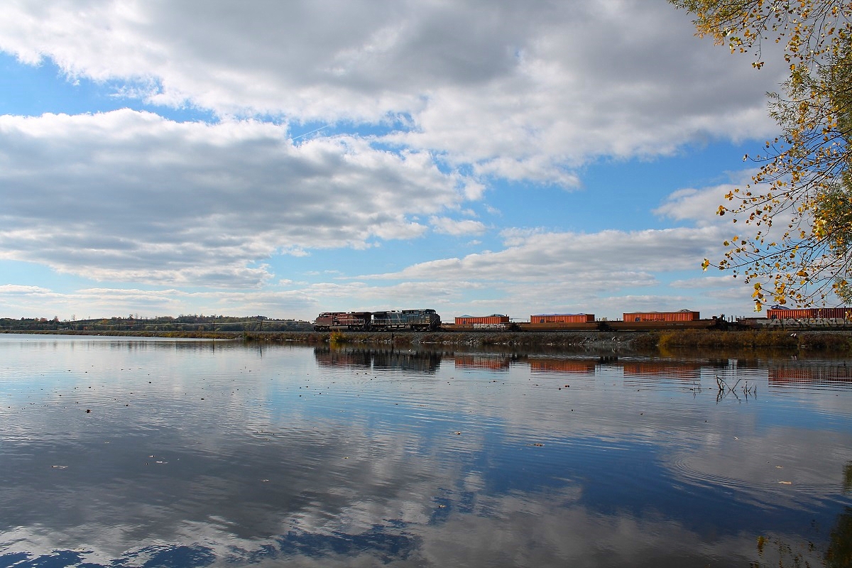 Wildly blowing the horn for trespassers fishing off of the dam, a pretty decent lashup for what CP is now proceeds west.