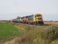 A trio of 4-axle GE's (MMA 2005, MMA 8592 & MMA 8578) are temporarily stopped at a crossing somewhere between Farnham and Brigham, Qc with an eastbound train (can't be completely sure of location). For more train photos, check out http://www.flickr.com/photos/mtlwestrailfan/