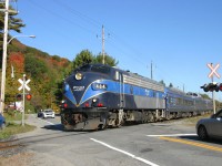 
The Orford Express running west to Eastman , passing the Route 112 on a beautiful autumn sunday afternoon !
