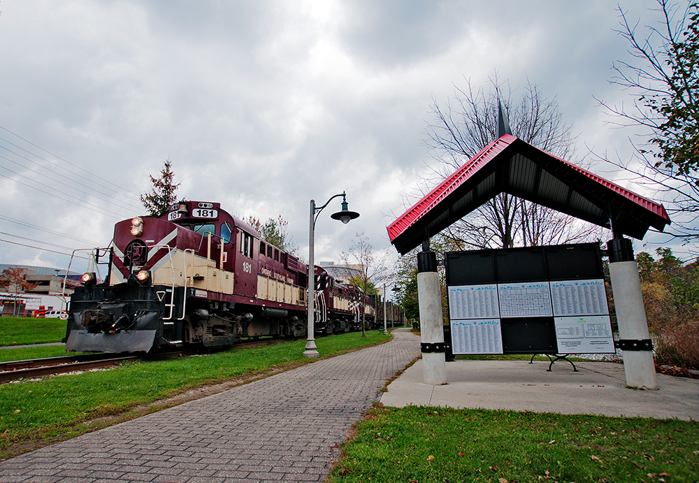 Ontario Southland Railway's Job Number One is heading back to Guelph Junction with interchange traffic for CP's London Pickup Job to lift tonight and is seen running through John Galt Park in Guelph.