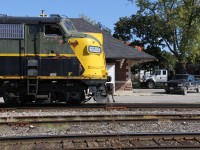 OSRX 6508 rests in front of the Woodstock depot. The OSR crew has just arrived and are about to fire up the engines for today's work. Interestingly, I saw them start the engines up (here) and power them down later at the Salford shops to end the day. Trailing the 6508 is GP7 number 383. The words, "Spirit of St. Jacobs," can still be noticeable under the cab window, a reminder to its previous use powering the Waterloo-St. Jacobs tourist train on the Waterloo Spur between Waterloo and St. Jacobs.