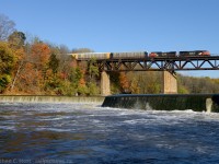 CN 148 is passing over the Grand River and former mill site at Paris, Ontario.
