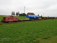 <b>1,000,000+ lbs</b> of steel are riding on 24 axles between two flat cars, five idlers, and two locomotives. Oh and a Caboose PHNX 101. Gross Weight, 505 tons. Destined to the Davis-Besse Nuclear Power Plant and shipped out of Babcock and Wilcox in Cambridge, Ontario. Made in Canada.