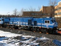<i>"That's not a CN locomotive!"</i> Nope. One of five brand-new Algerian National Railways/Société Nationale des Transports Ferroviaires (SNTF) export locomotives built by EMD in London ON (model GT36HCW) heading to the port for shipment overseas. Factory fresh SNTF 060DS02 to -05 were on this special GEXR train headed for delivery to CN, along with four Euro Cargo Rail Class 66 (or 77 rather) units for the United Kingdom. The old and well-known Peel Memorial Hospital by Centre St. serves as this photo's placemarker for Brampton, Ontario.
<br><br>
Evening consist of the day:<br>
RLK (GEXR) 2211, 4096, LLPX 2236 + SNTF (Algeria) 060DS02, 060DS03, 060DS04, 060DS05, 060DS06 + EWS (ECR, UK) 077006, 077007, 077008, 077009
