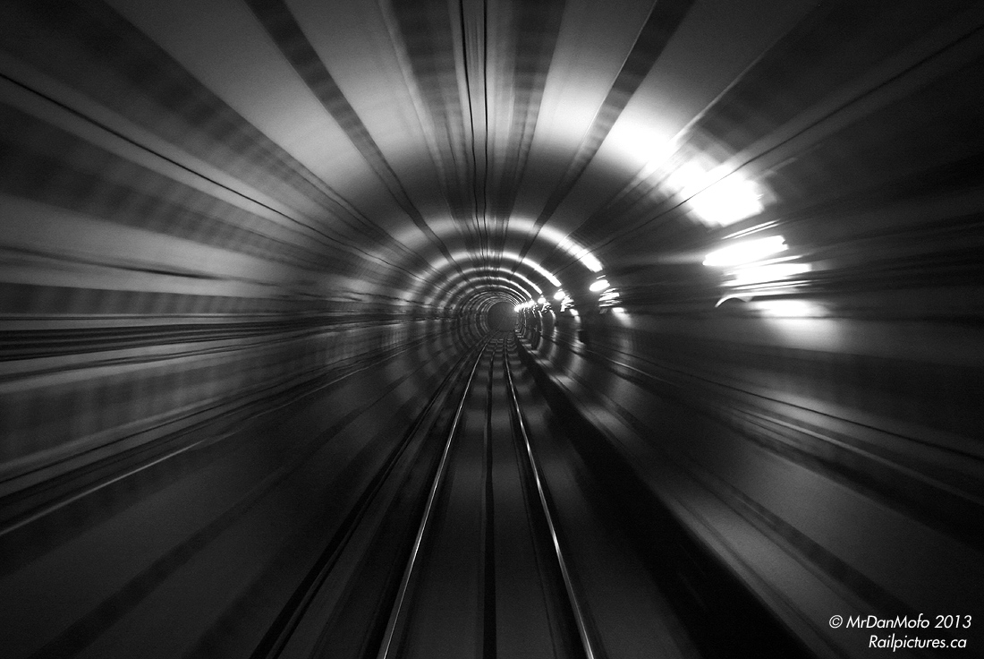 The tunnel lights are zipping by as our train heads south on the stretch between Lawrence and Eglinton subway stations, traversing part of the TBM-bored Yonge subway line extension between Eglinton and York Mills that was opened in 1973 (further north to Finch was opened a year later, in 1974).

*Note, geotagged location an approximation, not exact.