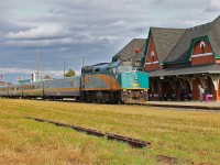 I've finally made use of the nice garden area that Entegrus provided across from the station. It provides a nice place with benches to enjoy the architecture of the old Grand Trunk station, today we were treated to F40PH-2d 6411 and a consist of LRC coaches.