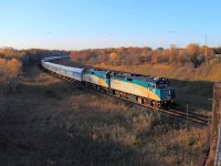 VIA Rail's eastbound "Canadian" departs Rivers at sunset.