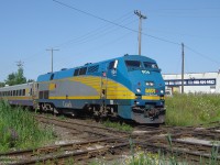 Slowing down in preparation for its station stop, VIA 904 rolls into town with train 84 from Sarnia, about to shatter the relative silence as it proceeds to "bang the diamond" before stopping at Brampton. The 5 LRC cars trailing 904 are full of passengers bound for Toronto, and the train will proceed express to Hogtown after making this one last stop in The Flower City.
<br><br>
Note the experimental bug deflectors, which were all the rage on a few of VIA's P42's for a while. They seemed to have vanished a number of years ago.