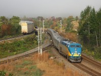 Via 916, sister to the engine (915) involved in the Ottawa train-bus derailment that killed six a few weeks ago, leads a nice heritage consist through Bayview. On the left is a CP Northbound with CEFX 1051 and 9662 leading a 67 car consist, consisting almost solely of loaded coil cars and articulated autoracks. It took about 15 minutes from when the head end passed me to this scene hear. 