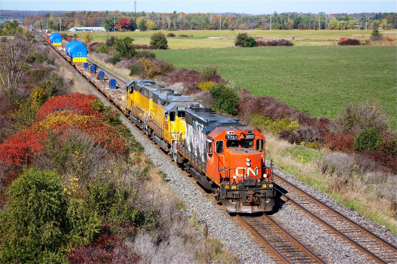 Goderich Exeter's LLPX GP38s brought the dimensional train to Silver for CN to lift but the CN GP38 failed and all three continued on to Hamilton after repositioning power and the caboose.