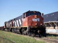 After waiting for a switch job to head out to the Tolko mill north of town, HBRY train 991 to Flin Flon pulls out of the yard and passed the station in The Pas.