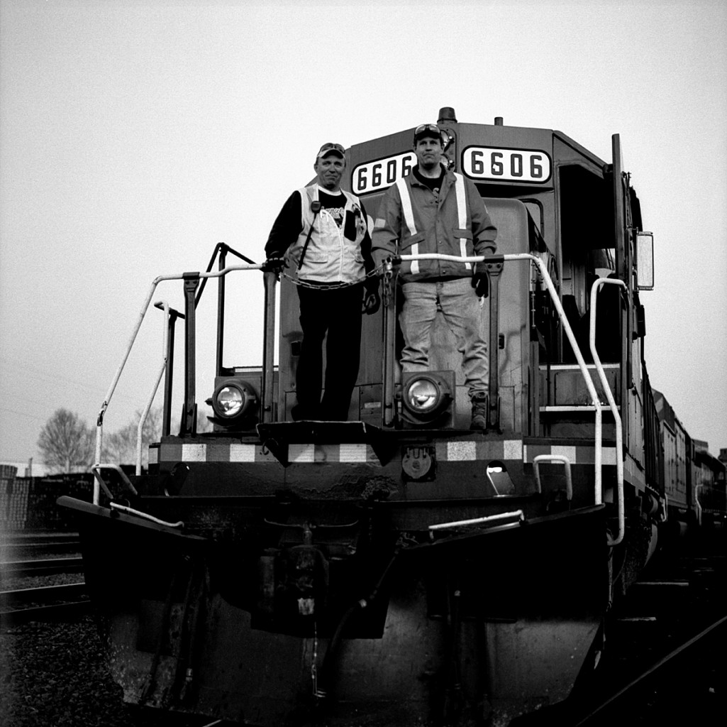 Conductor Rose and Engineman O'Driscoll hop on the head end of 431's power to get it fired up and ready for a westbound run.  They'll switch out a few tracks and make a lift, brake test it, then double on to their train on the Center Lead.  They will be moving after dark.  (Can't remember the exact date)
