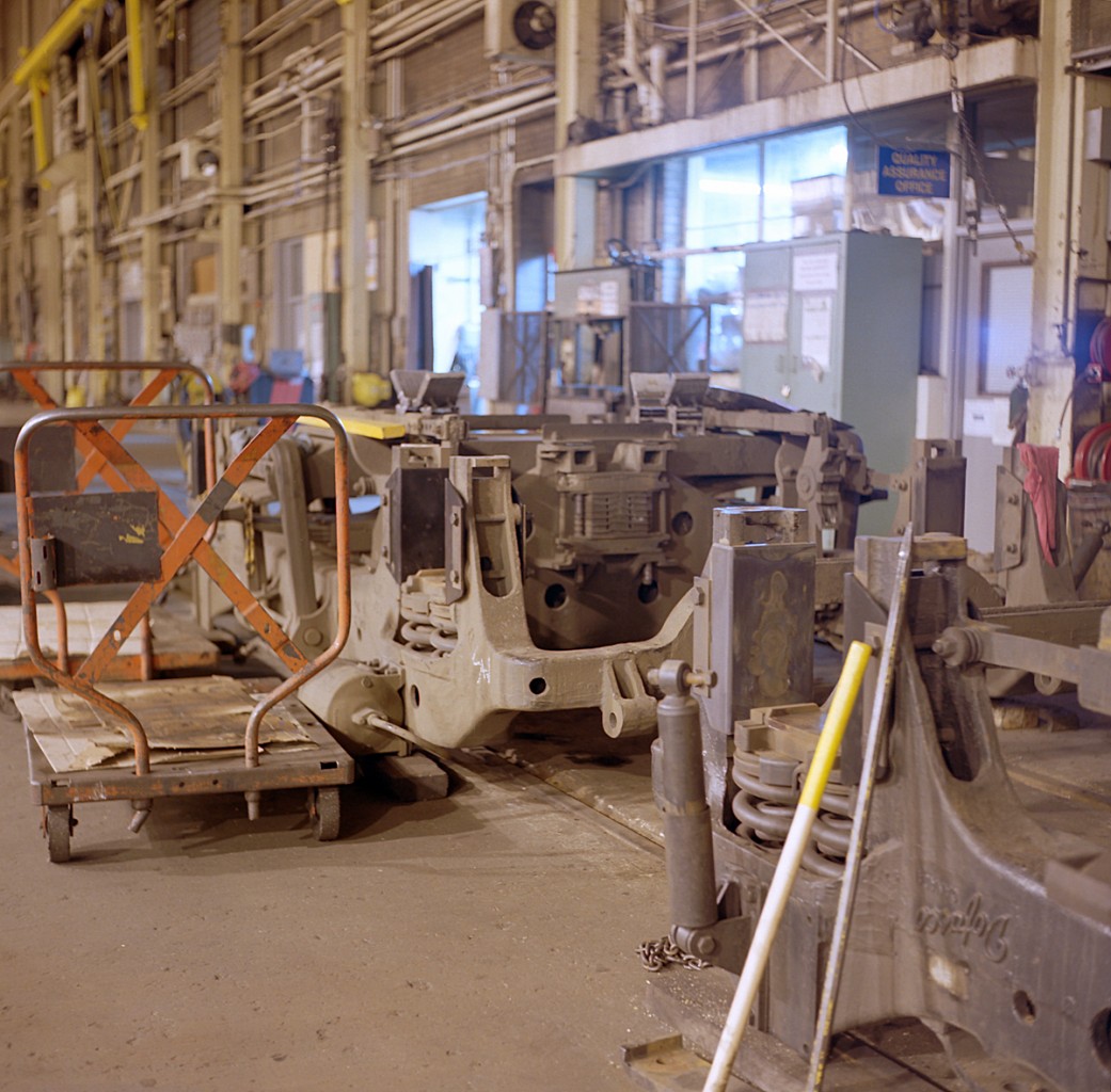 Constantly cycled among ONR's 1800 and 2000 series units, these Blomberg 'B' trucks sit upturned on the floor of the wheel shop.  They are waiting for shop staff to get back at things the next morning.