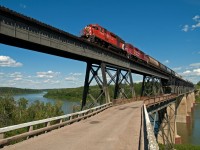 Nipawin SK has one heck of a bridge, too bad it sees so few trains. This was one of only four trains to use it in 2007, though reportedly in 2004 it wasn't used at all. I imagine it sees slightly more use now that CP has sold the line to a shortline called Torch River Rail.  