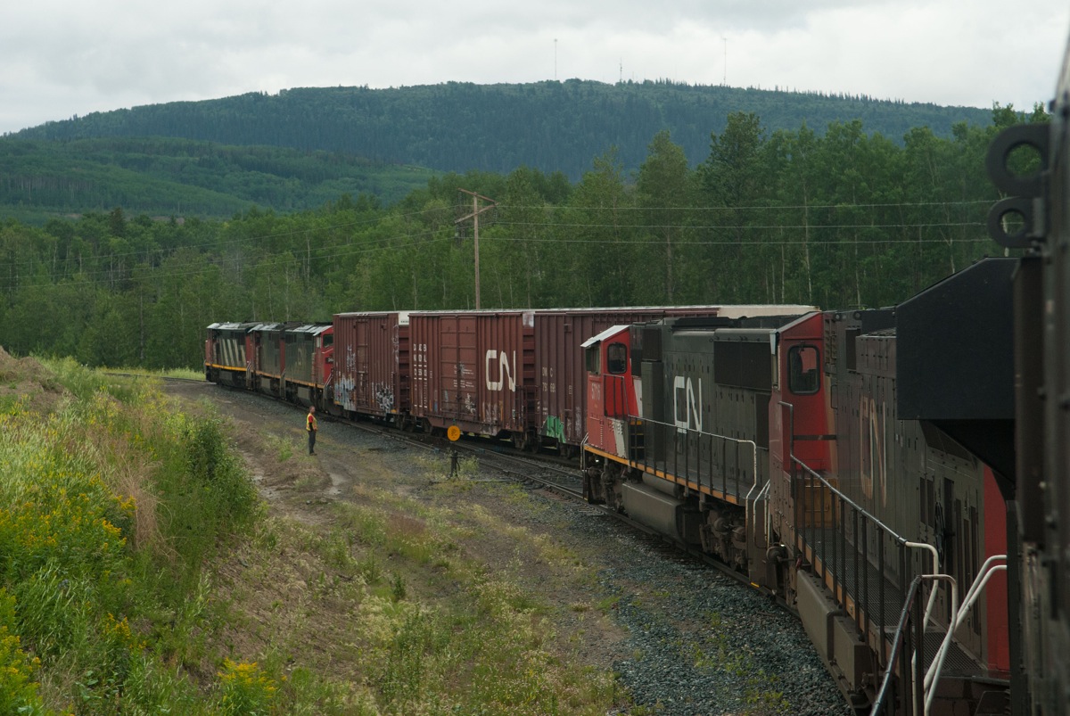 CN 579 with its usual three-pack of Drapers departs Chetwynd yard bound for Dawson Creek, while 472's power waits to go around the wye.