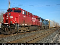 CP Train #235-14 with CP 8948 and CEFX 1033 waits patiently in the siding at Belle River for a 10,000 foot plus 142 to pass by before continuing on to Windsor.