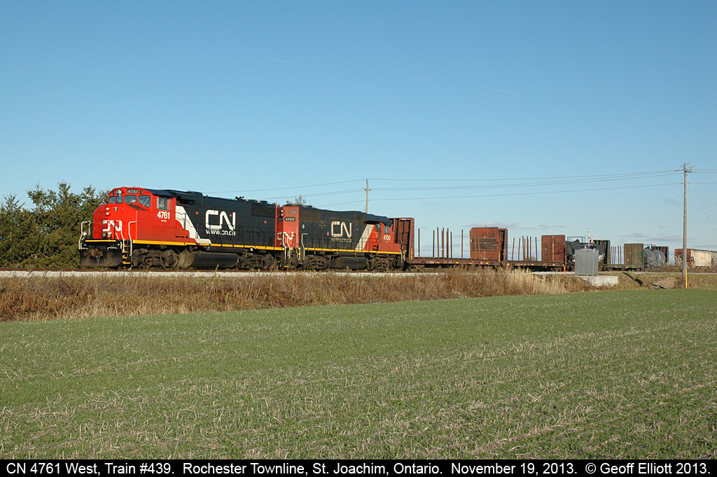 CN 4761, in fresh paint, leads CN train #439 toward Windsor as is passes over the Rochester Townline near St. Joachim, Ontario on a beautiful, sunny November day.