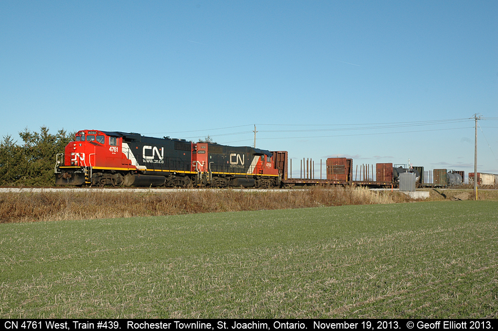 CN 4761, in fresh paint, leads CN train #439 toward Windsor as is passes over the Rochester Townline near St. Joachim, Ontario on a beautiful, sunny November day.